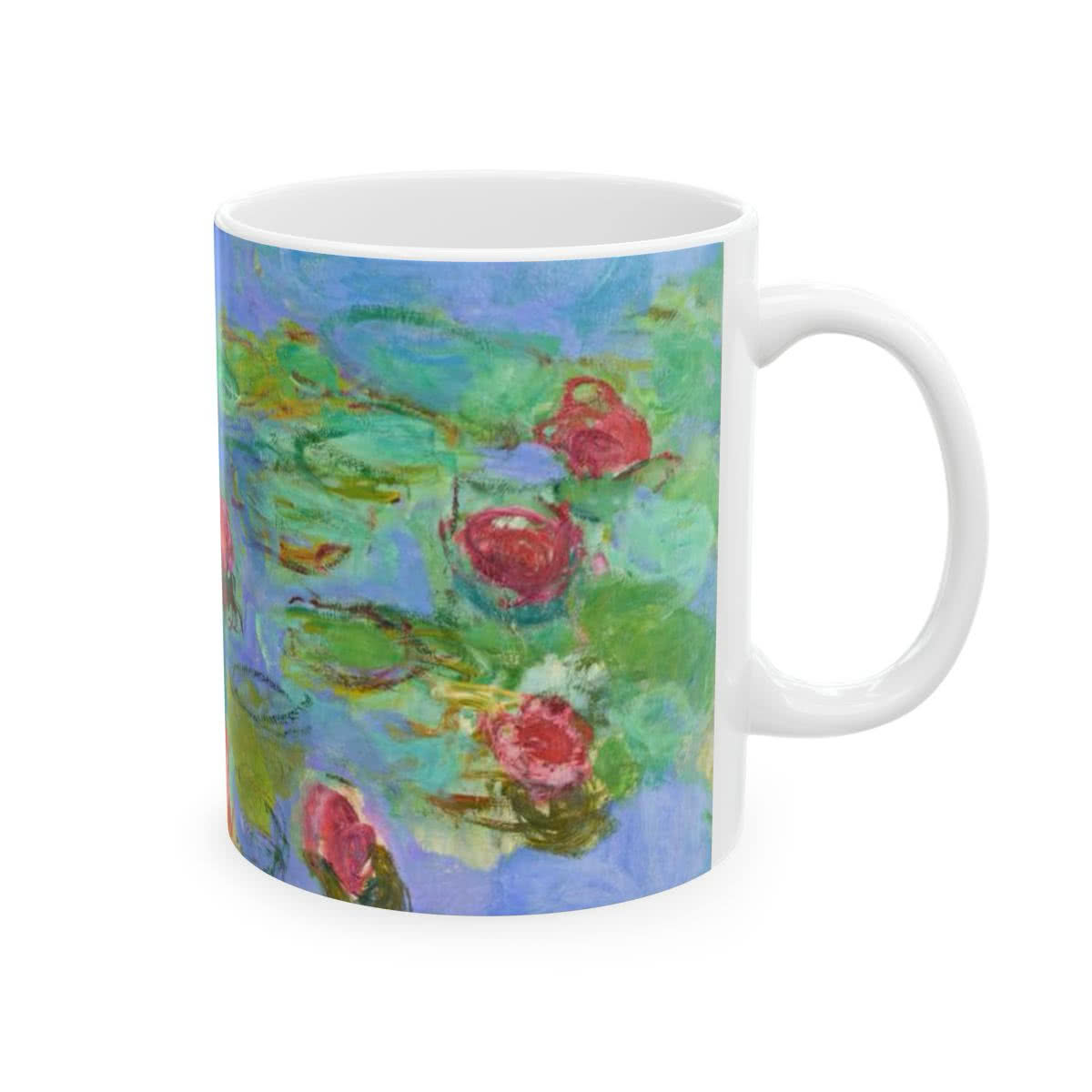 White ceramic mug printed with Claude Monet water lilies in blue, green, and pink.