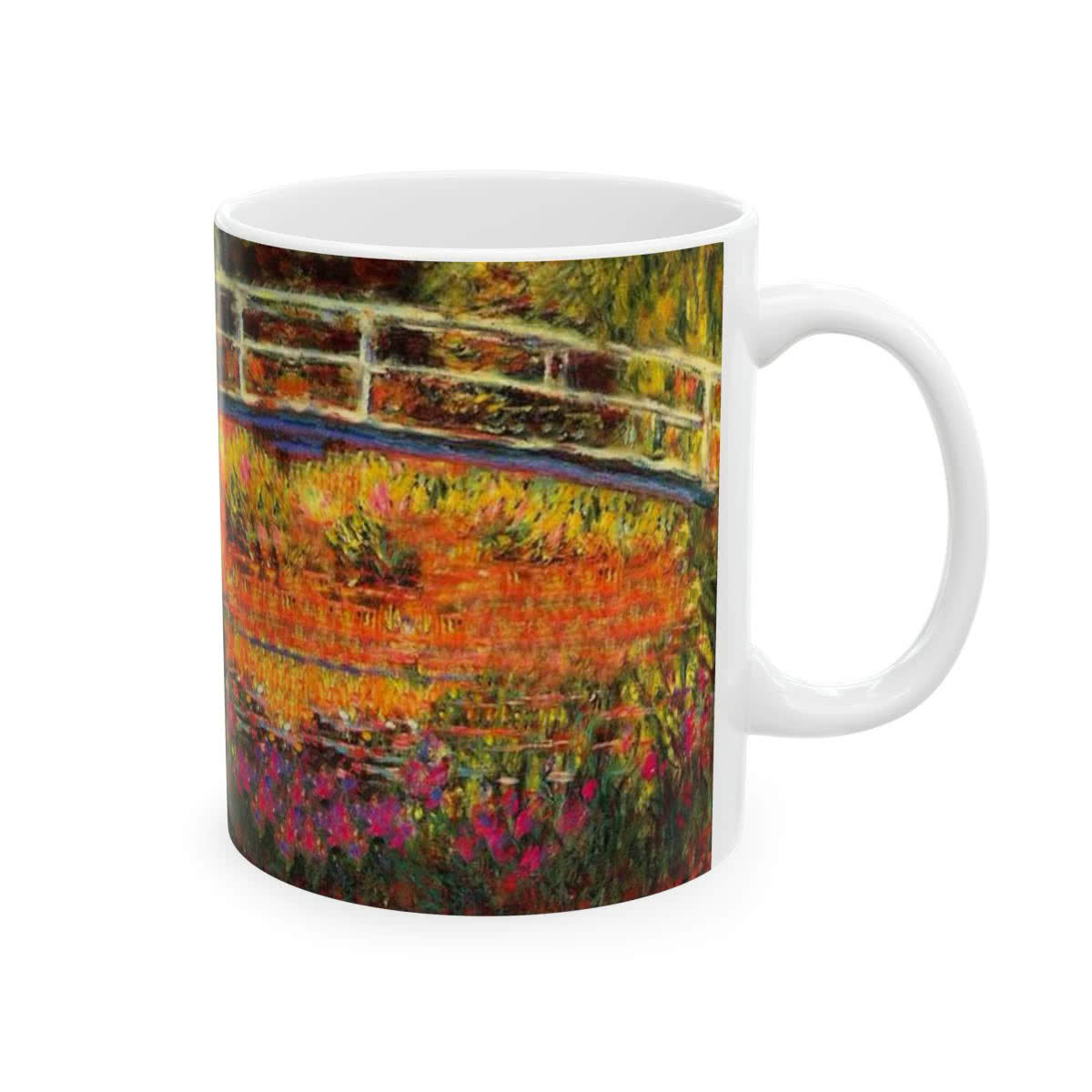 White ceramic mug printed with Claude Monet’s Water-Lily Pond, Water Irises and Japanese bridge.
