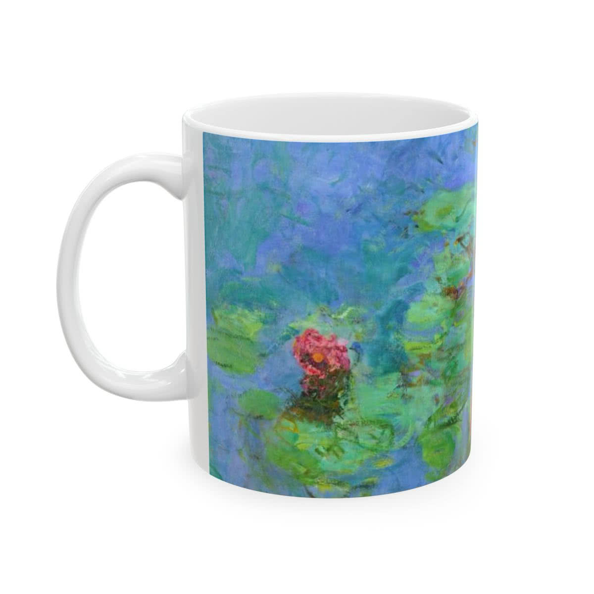 White ceramic mug printed with Claude Monet water lilies in blue, green, and pink.